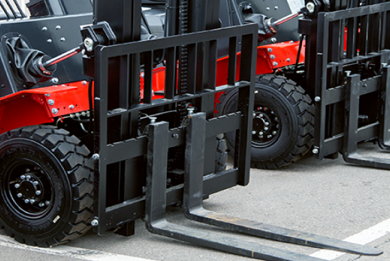 Parked red forklifts