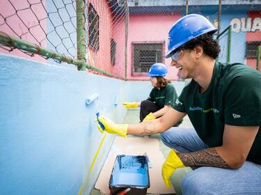 Volunteering painting school IMPACT Day